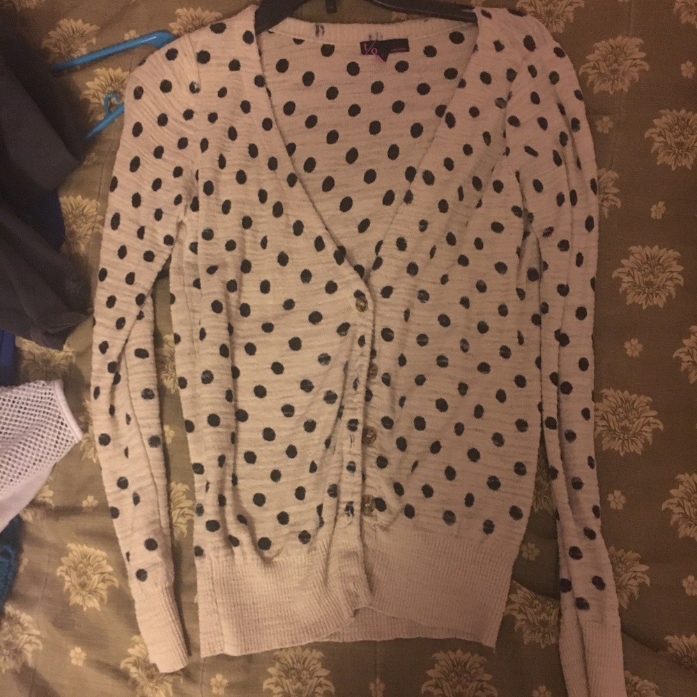 Polka dot black and tan cardigan.
